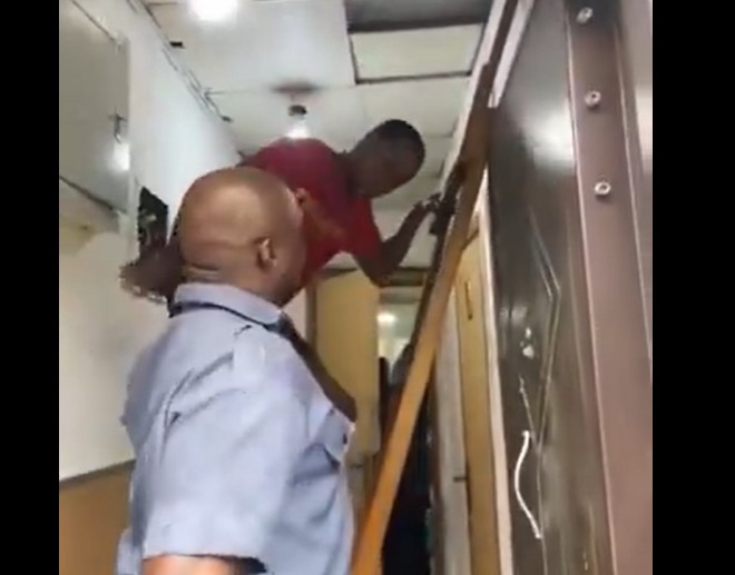 Man dragged out from Access Bank Ceiling, attempts night hack