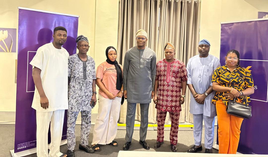 Photo caption: Chris Ofikulu, Executive Director, Retail & Commercial Banking, Polaris Bank Limited with some Customers at the South West Trade Forum sponsored by the bank.