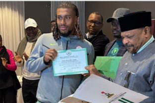 Super Eagles players received title documents to houses, lands and national honours certificates promised by President Tinubu